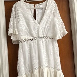 White dress, never worn, ruffle bottom